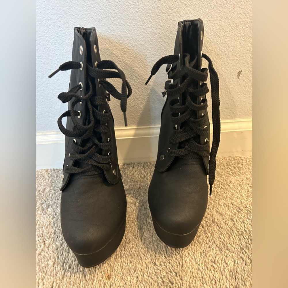 Black combat high heel boots